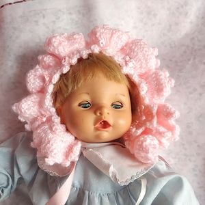 Handmade pink crochet baby hat frills